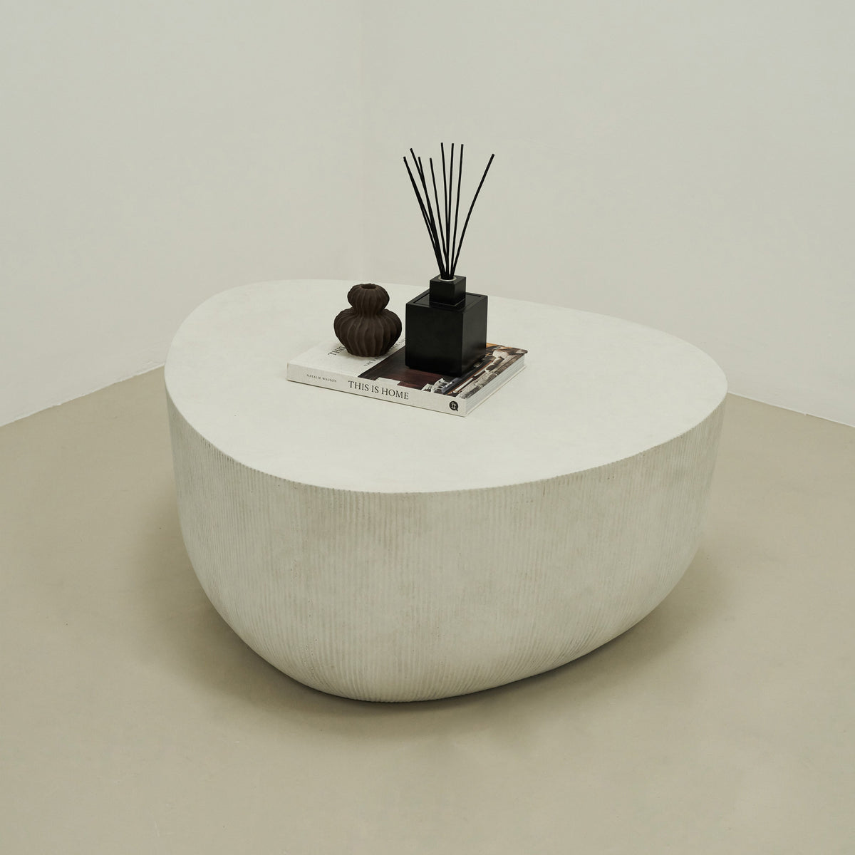 Minimal Concrete Irregular Shaped Coffee Table Large in muted room