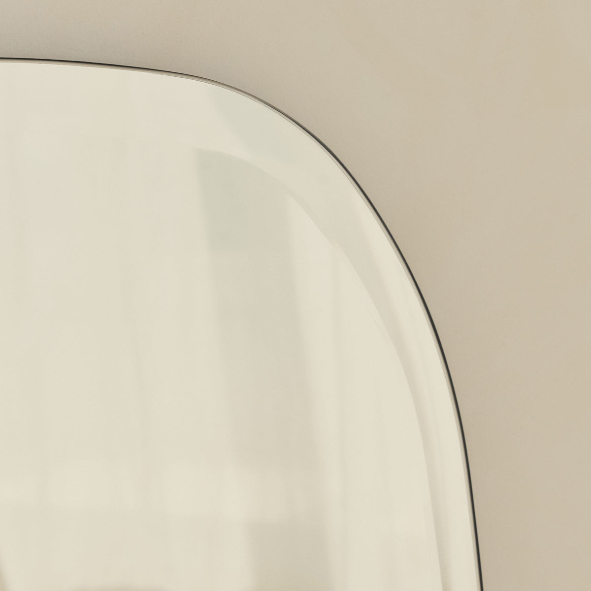 Vienna - Large Frameless Curved Bevelled Mirror 100cm x 65cm