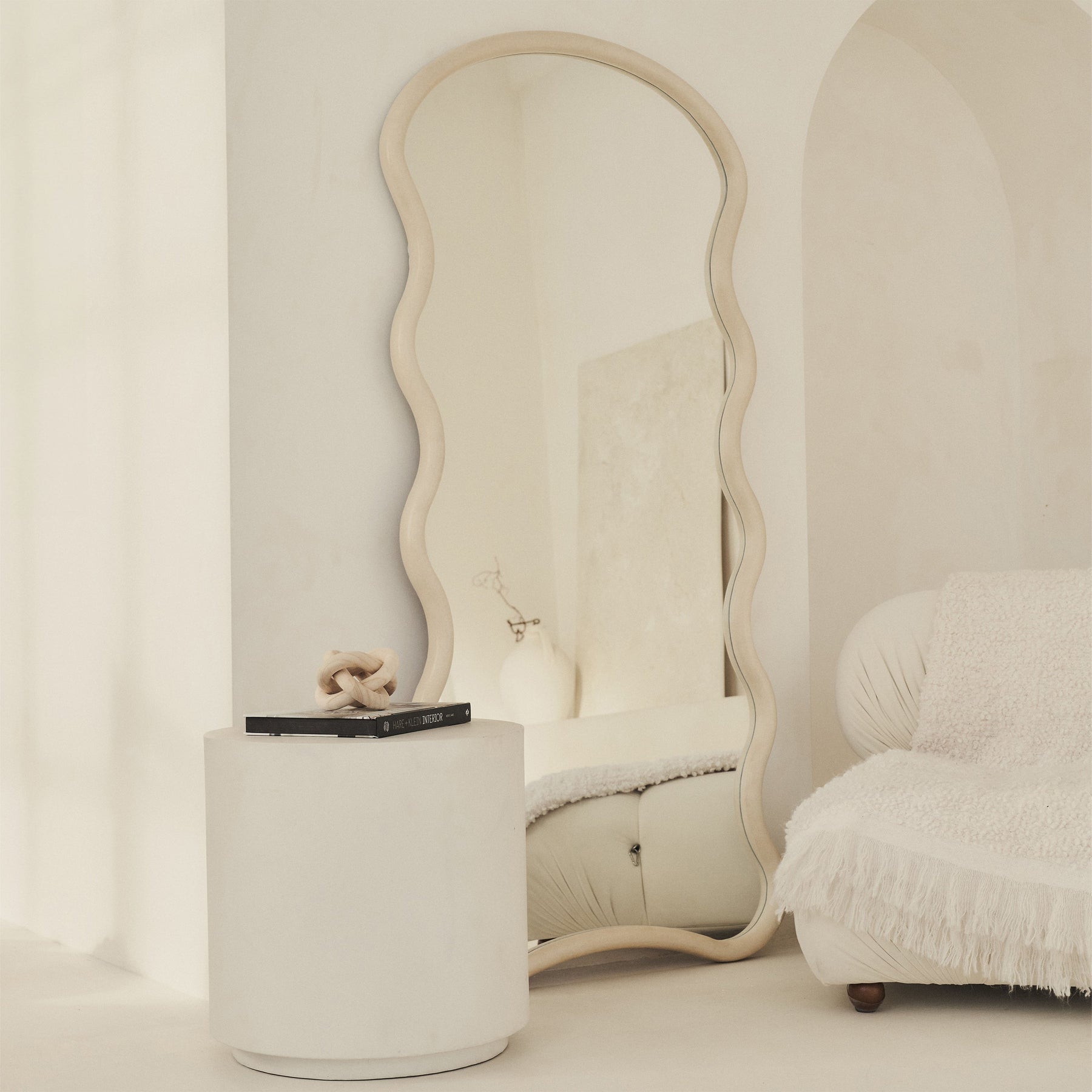 Large Full Length Concrete Wave Mirror leaning against wall