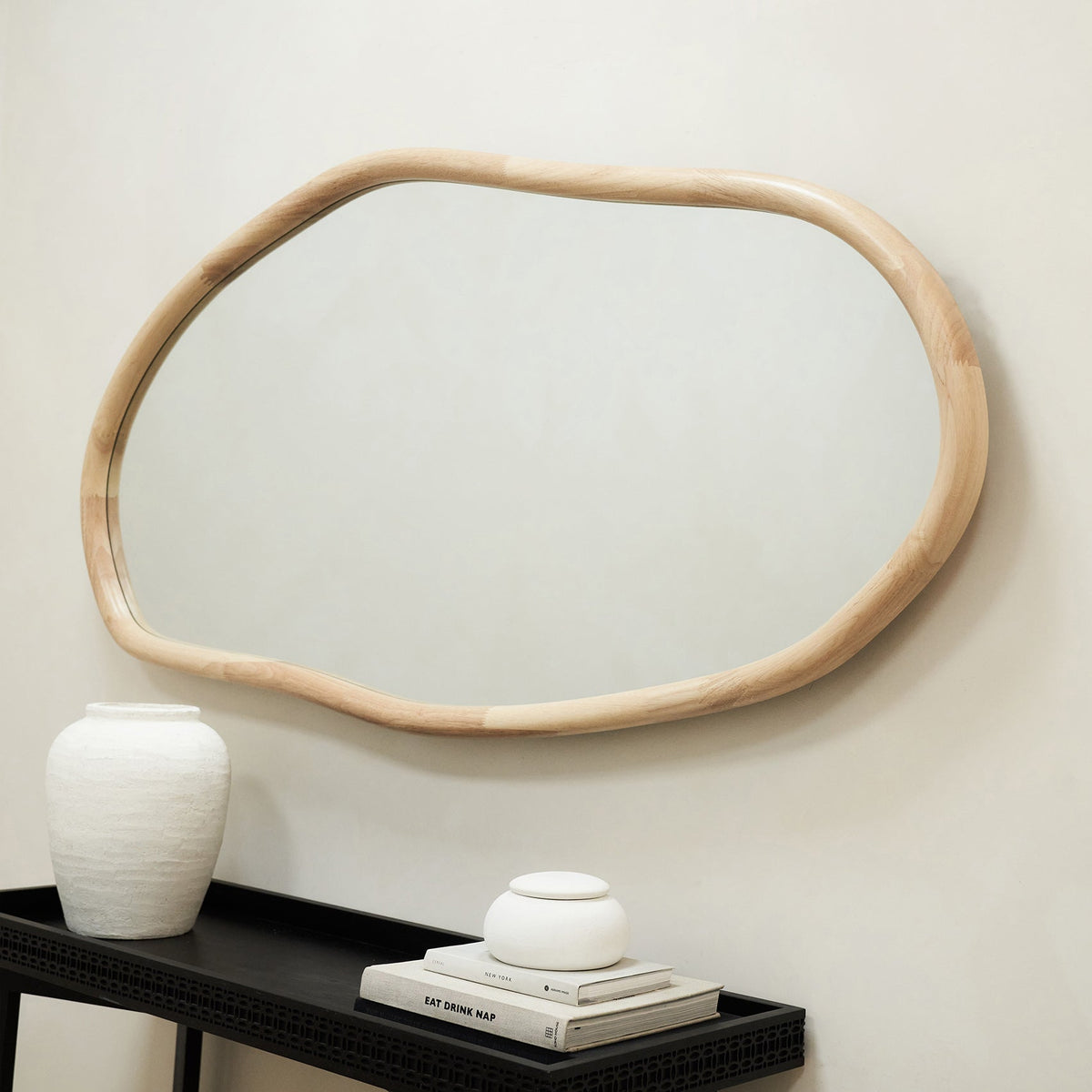 Natural Organic Irregular Wooden Wall Mirror hanging on wall