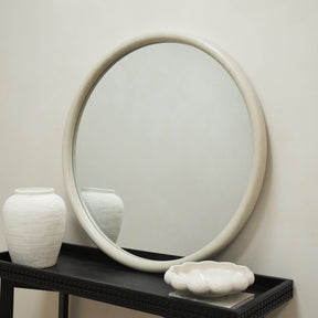 Our Large Concrete Round Wall Mirror leaning against wall