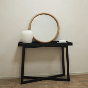 Wide shot of Natural Round Wall Mirror on console table