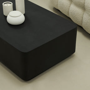 Minimal Onyx Rectangular Coffee Table Large adjacent to sofa