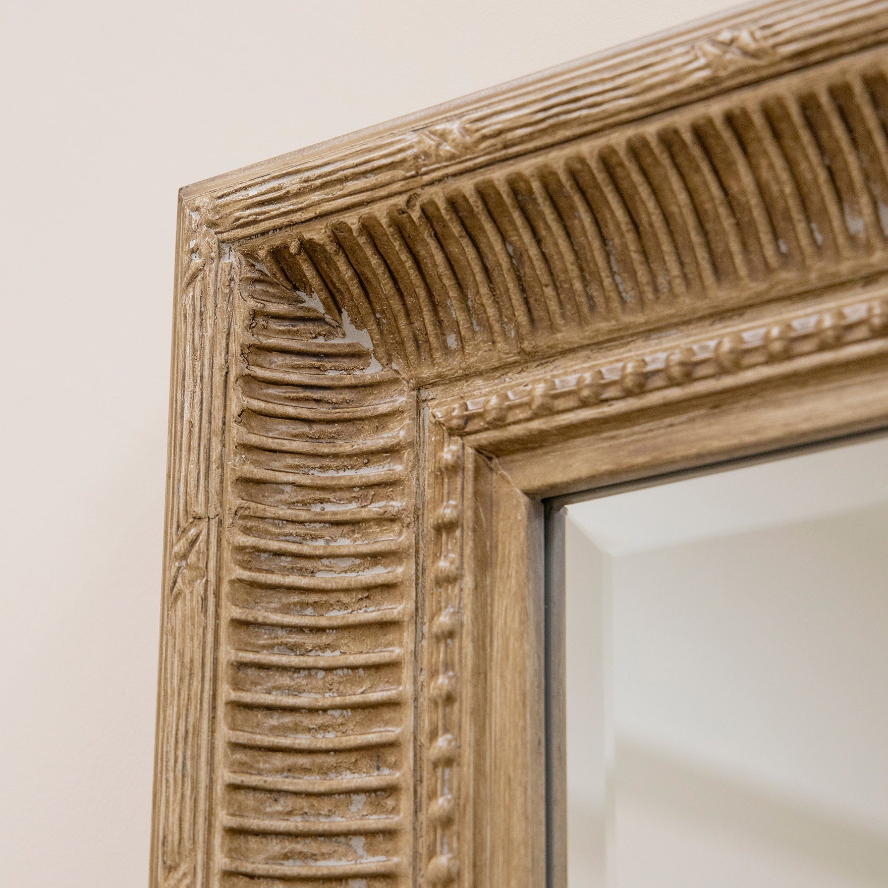 Closeup of extra large washed wood rectangular mirror