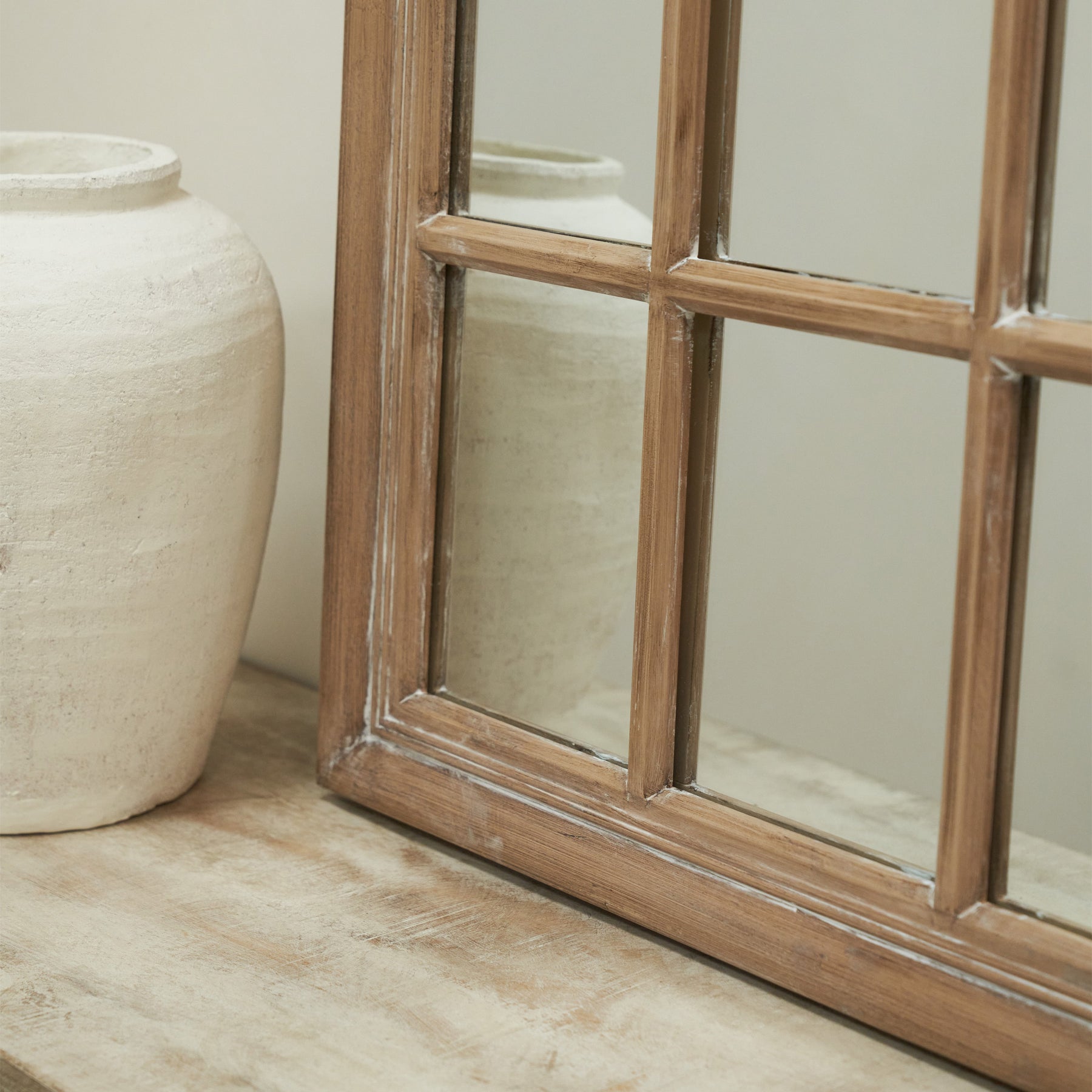 Detail shot of Washed Wood Arched Shabby Chic Window Mirror corner