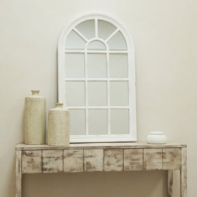 Wide shot of White Arched Shabby Chic Window Mirror on console table