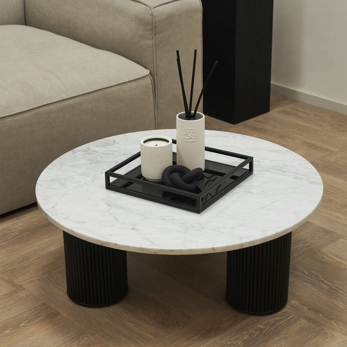 Marble Round Large Coffee Table next to sofa