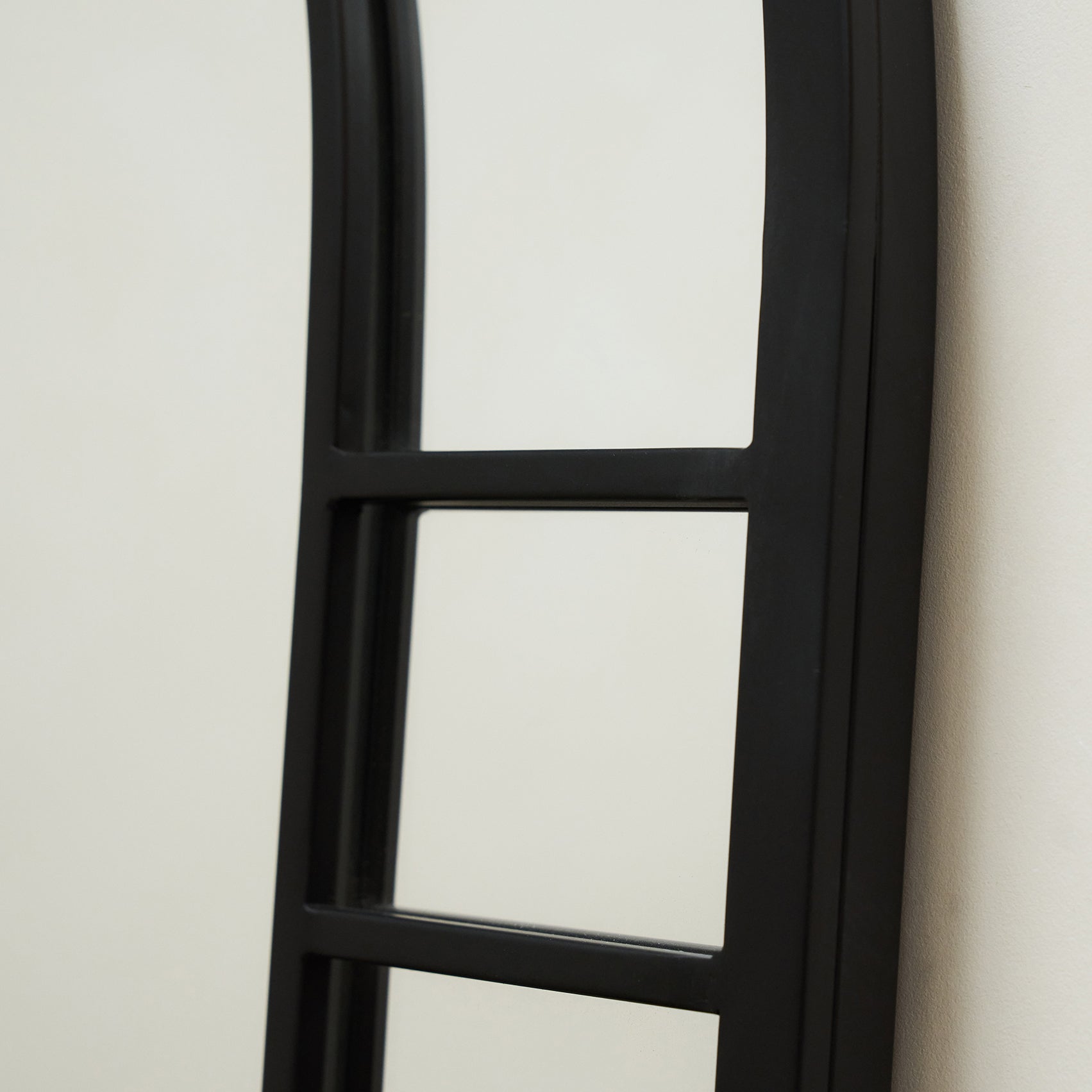 Closeup of Black Industrial Full Length Arched Metal Mirror frame