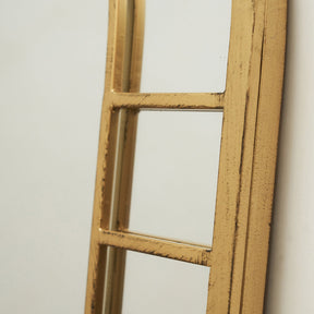 Closeup of Gold Industrial Full Length Arched Metal Mirror vintage gold frame