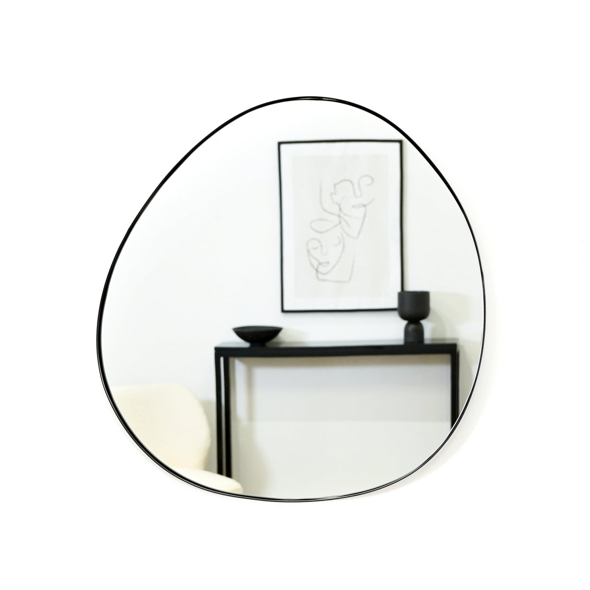 Black metal pond shaped irregular wall mirror