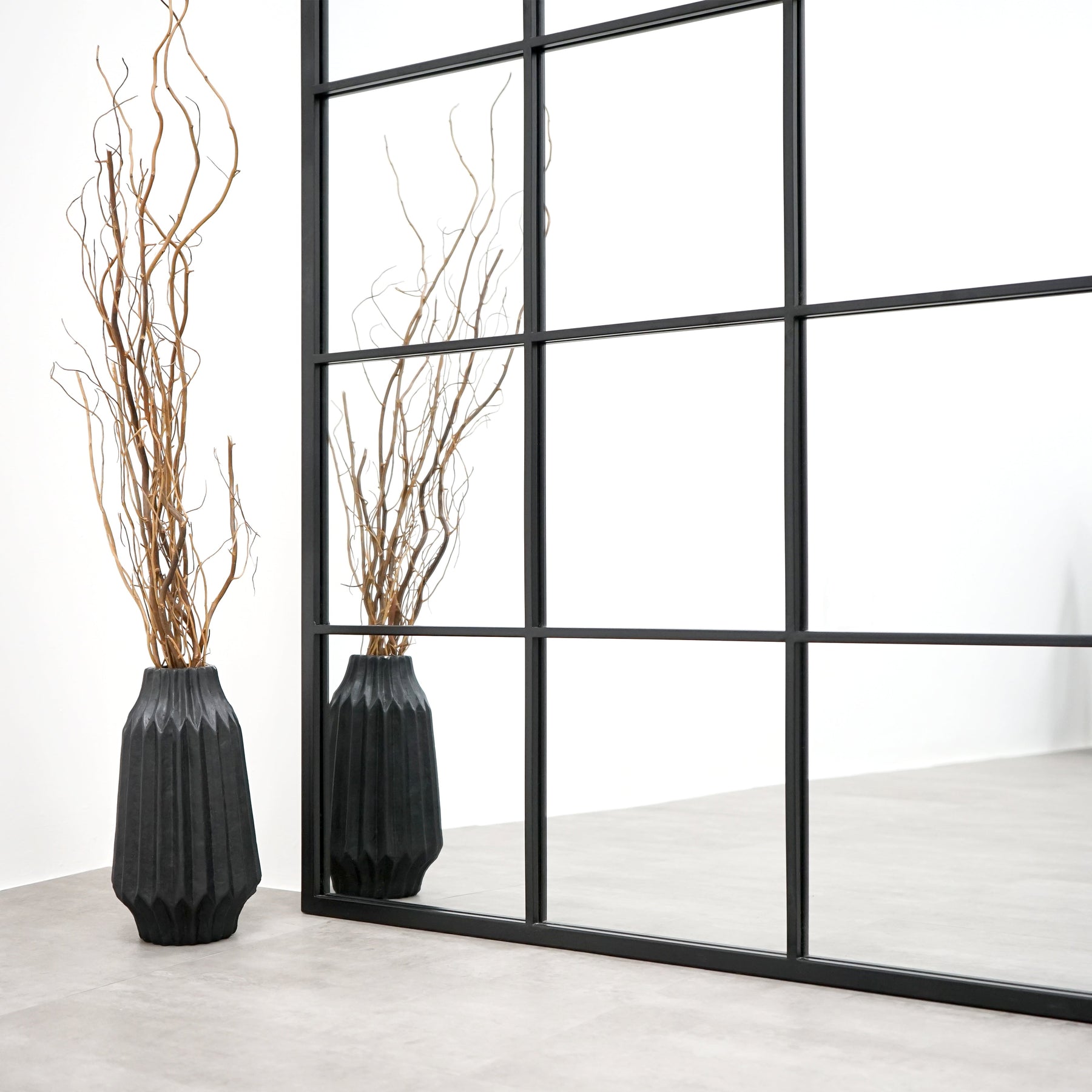 Full length extra large black industrial metal window mirror