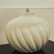 Textured ceramic based table lamp natural shade detail shot