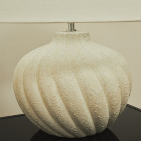 Textured ceramic based table lamp natural shade detail shot
