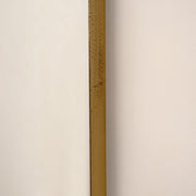 Closeup of Full length arched gold XXL vintage metal mirror