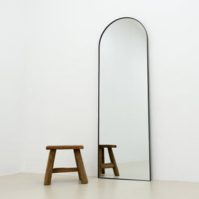 Full Length Black Arched Large Metal Mirror leaning against wall