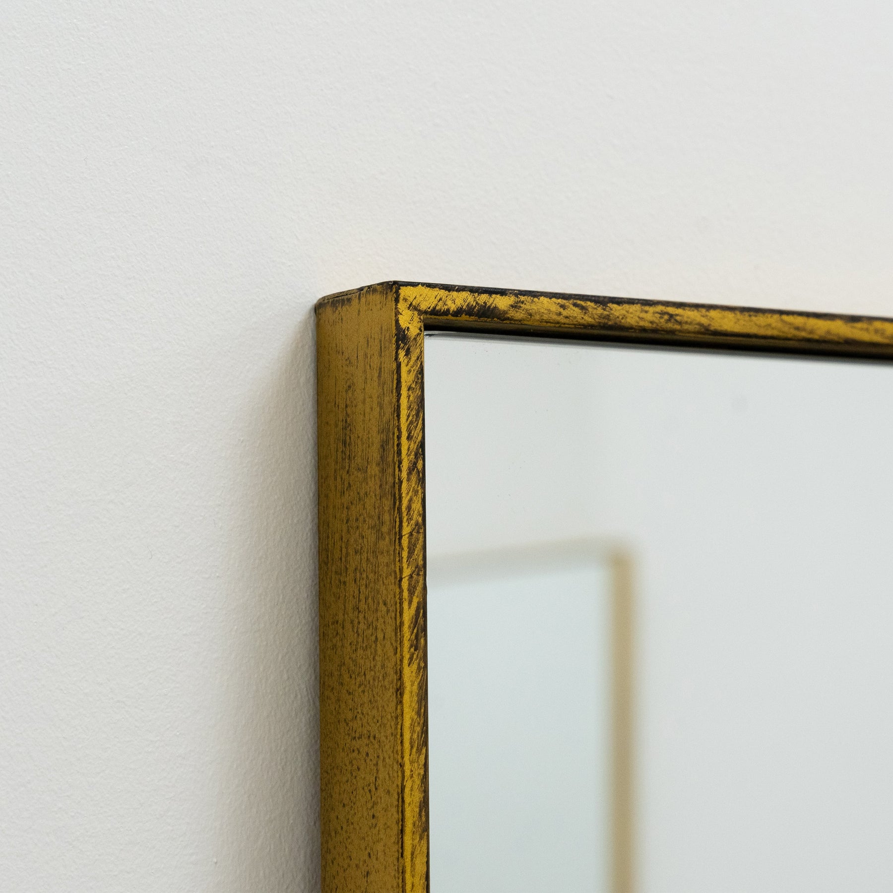 Detail shot of Full Length Gold Extra Large Metal Mirror top corner