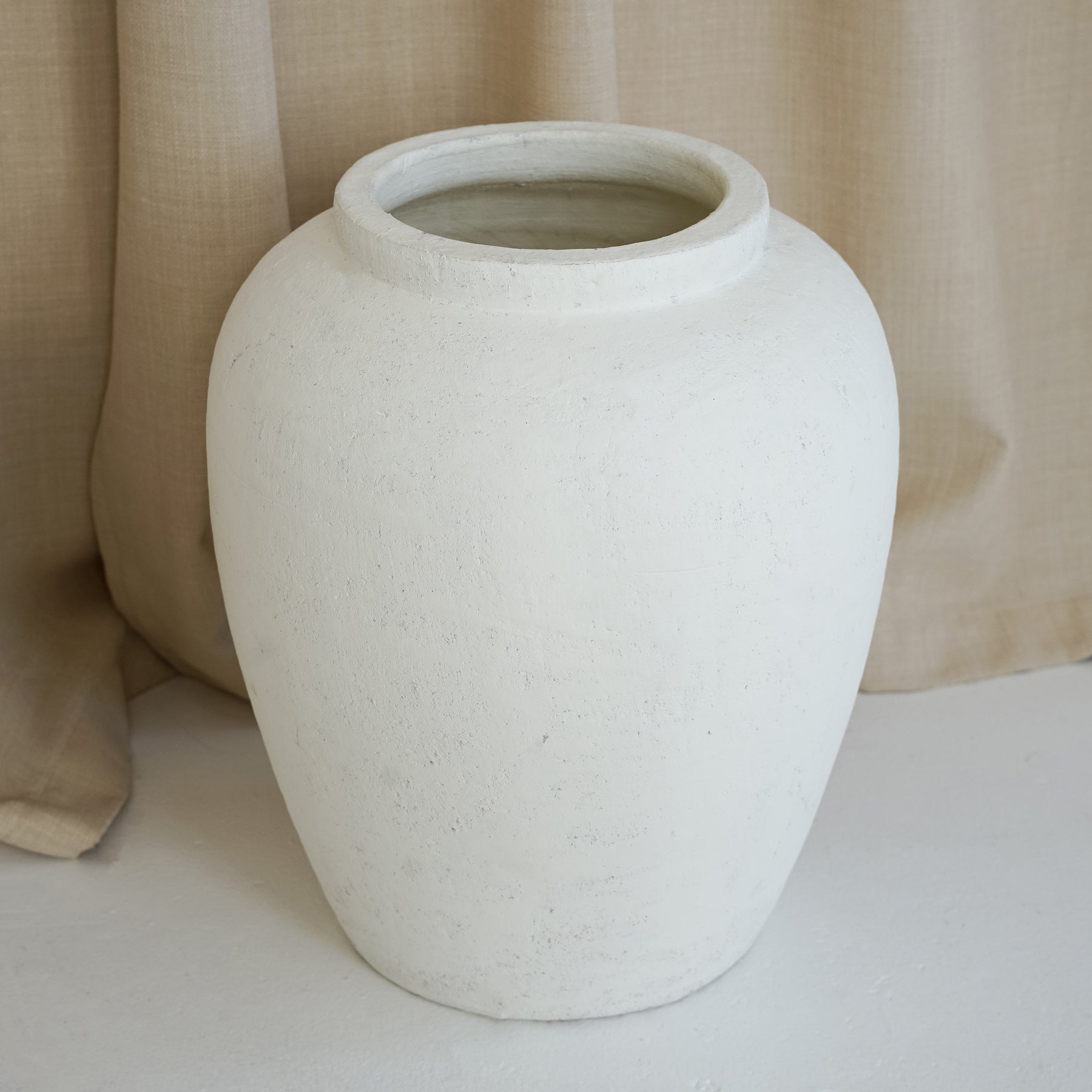 White Textured Terracotta Large Vase with fabric background