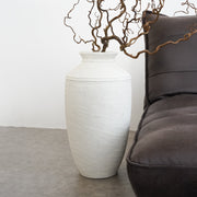White Textured Terracotta Large Vase beside sofa