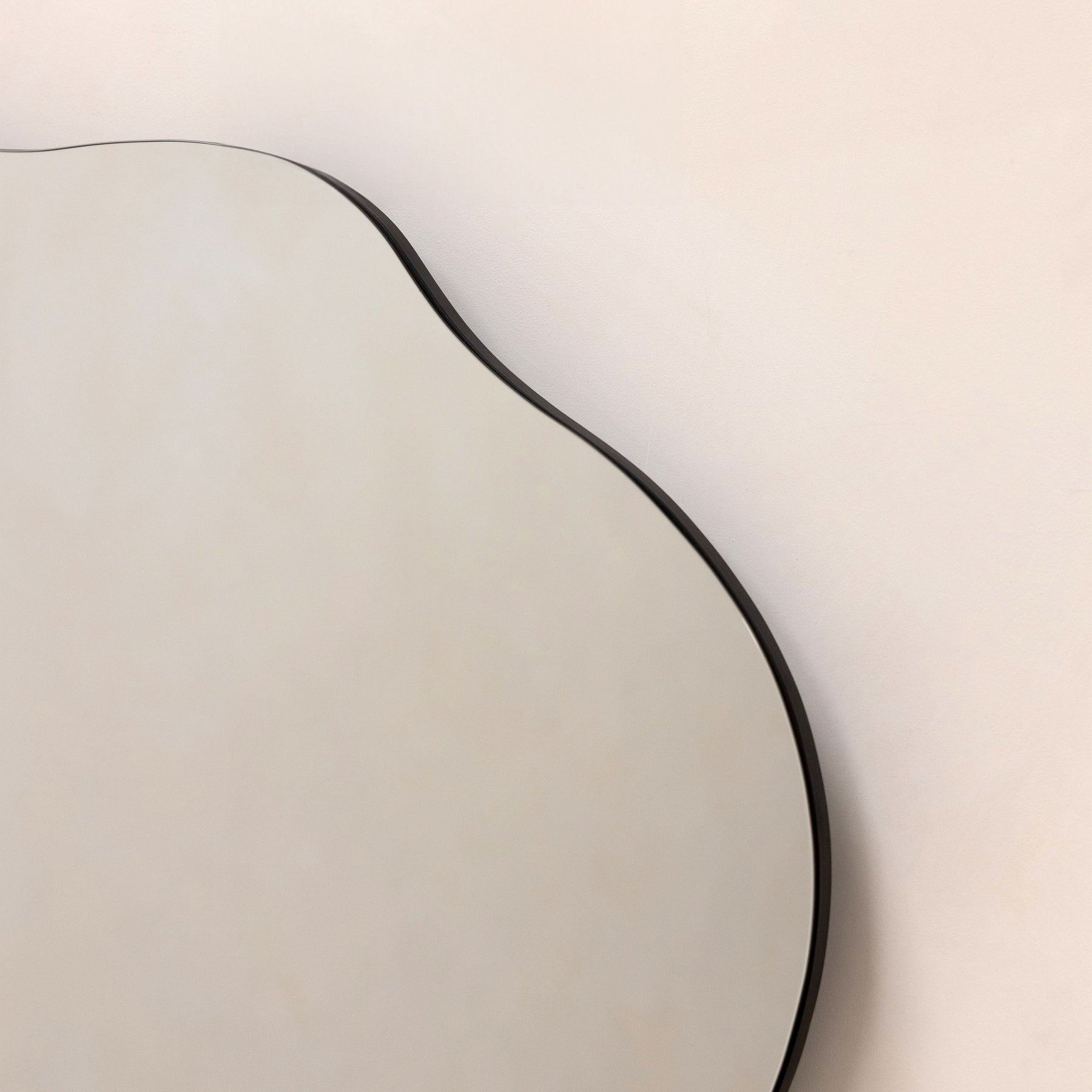 Small Frameless Pond Mirror detail shot of irregular curves