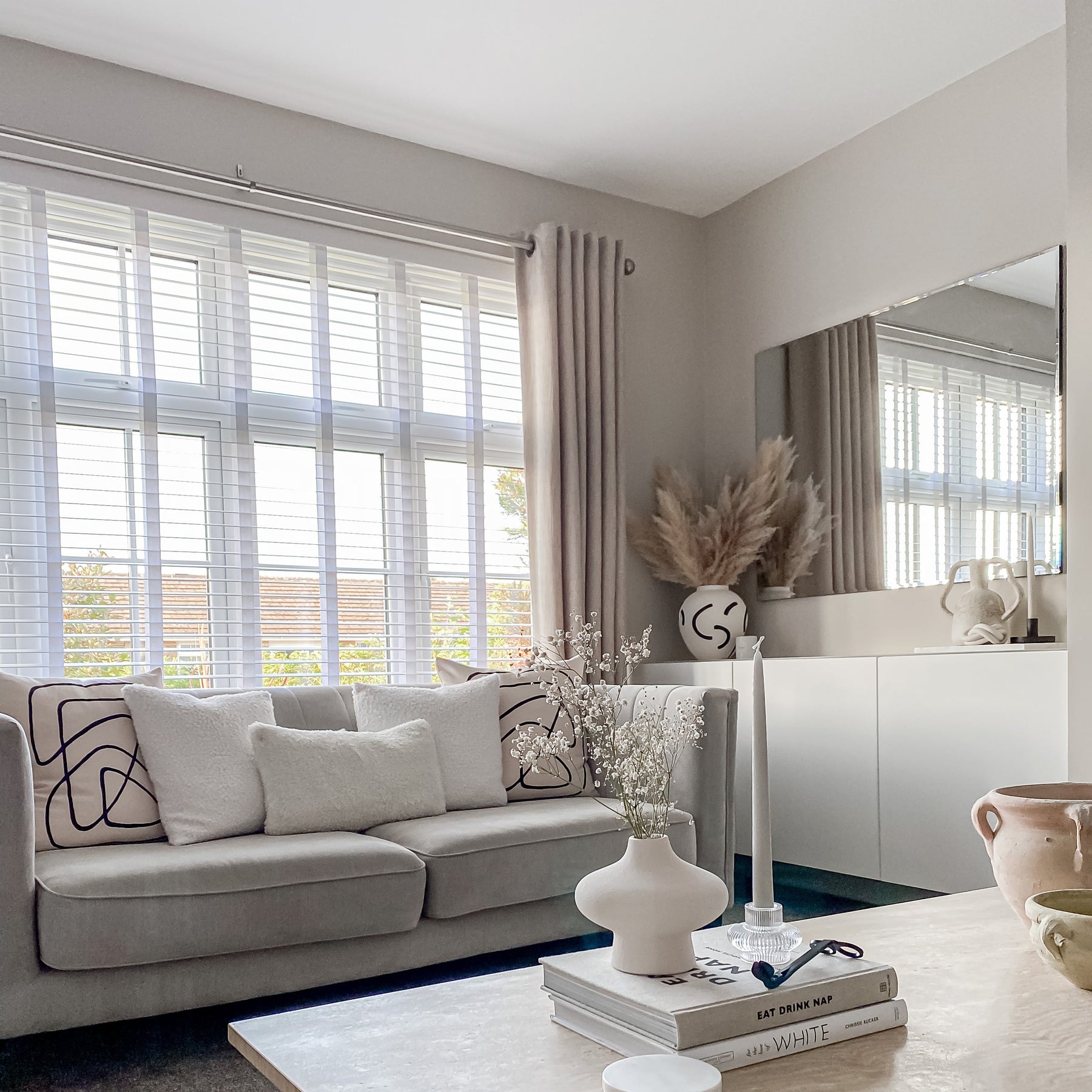 Large Frameless Rectangular Mirror in living room