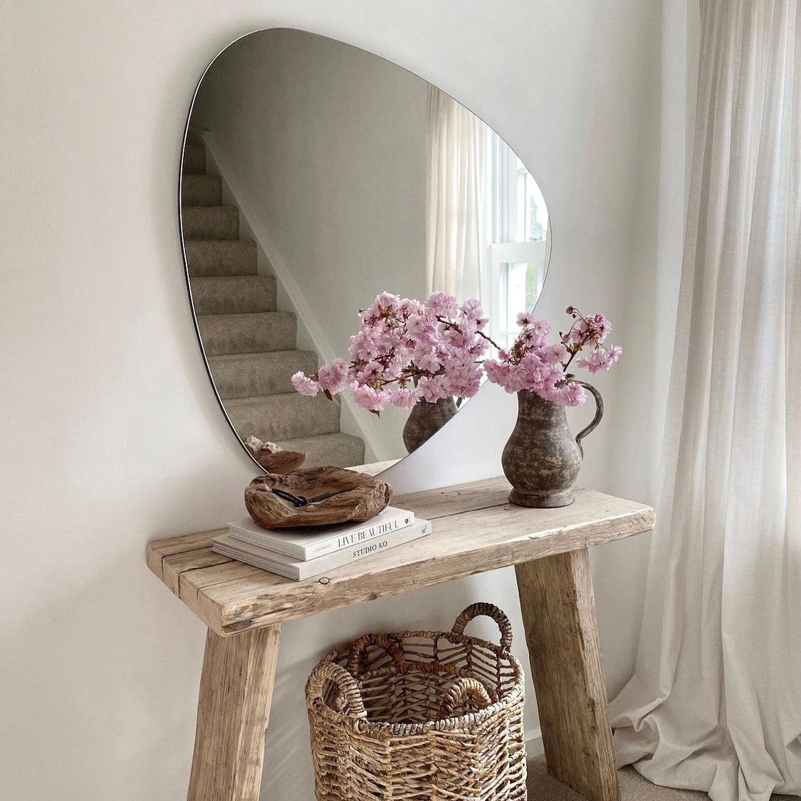 Medium Frameless Pebble Wall Mirror above console table