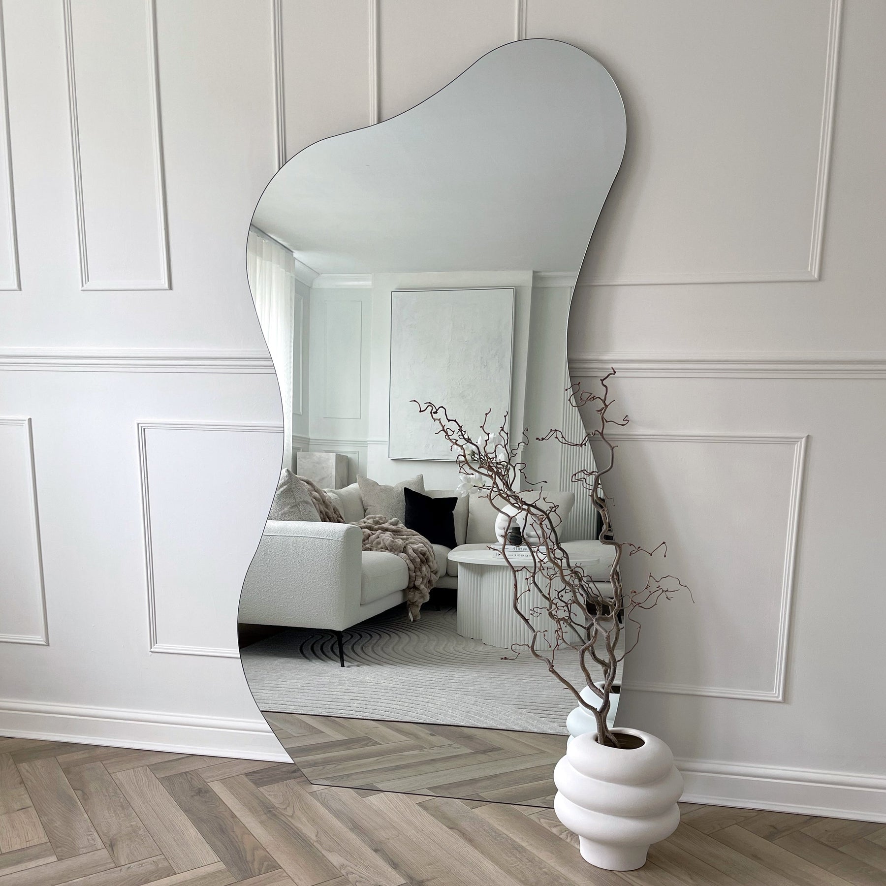 Extra Large Frameless Full Length Pond Mirror in lounge at daytime