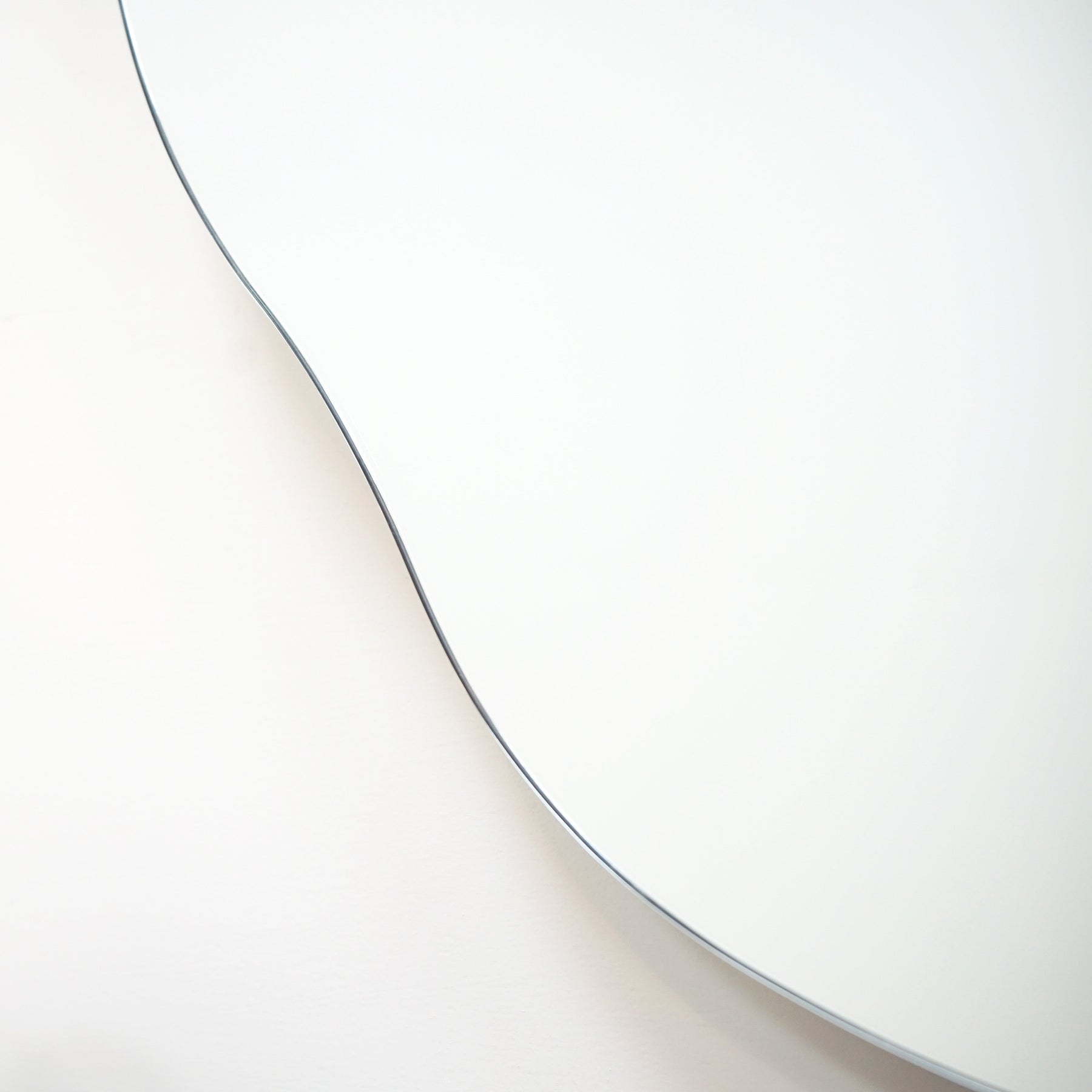 Small Frameless Pond Mirror alternative detail shot of irregular curve