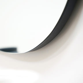 Small Frameless Pond Mirror detail shot of irregular curve