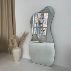 Large Frameless Full Length Pond Mirror leaning against wall