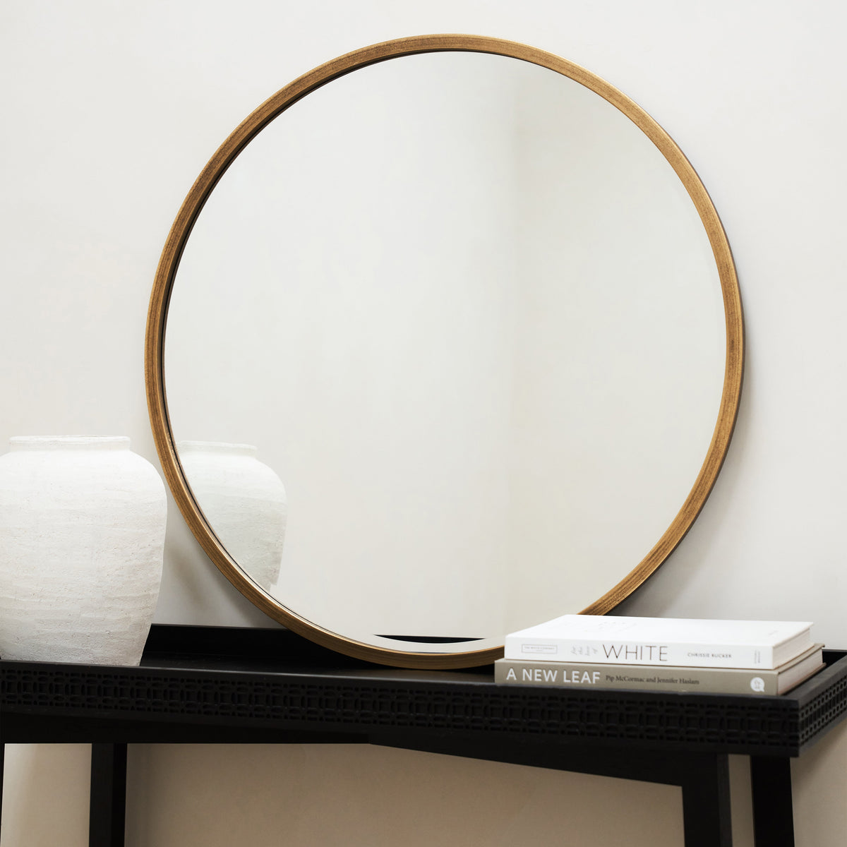 Gold Metal Modern Round Wall Mirror on console table