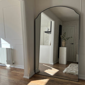 Black Full Length Arched Metal Mirror alternate shot in living room