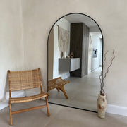 Black Full Length Arched Metal Mirror as living room lean to