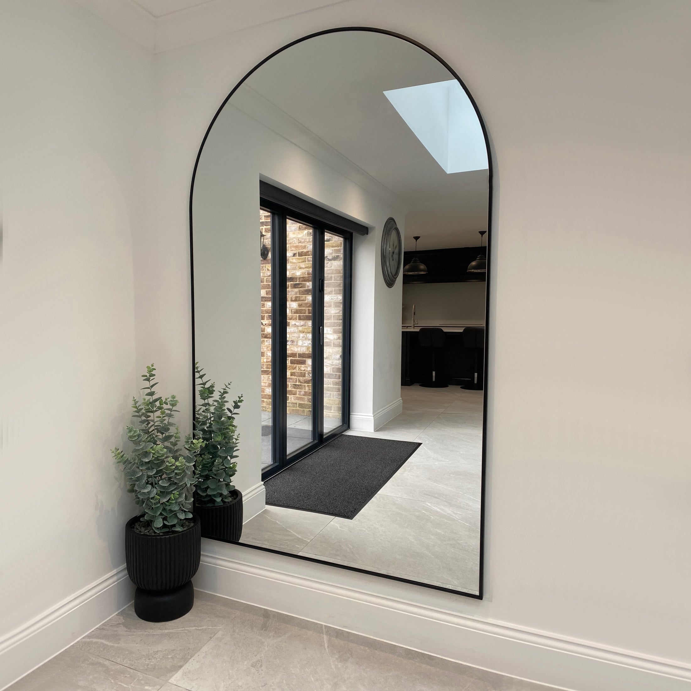 Black Full Length Arched Metal Mirror as kitchen wall mirror