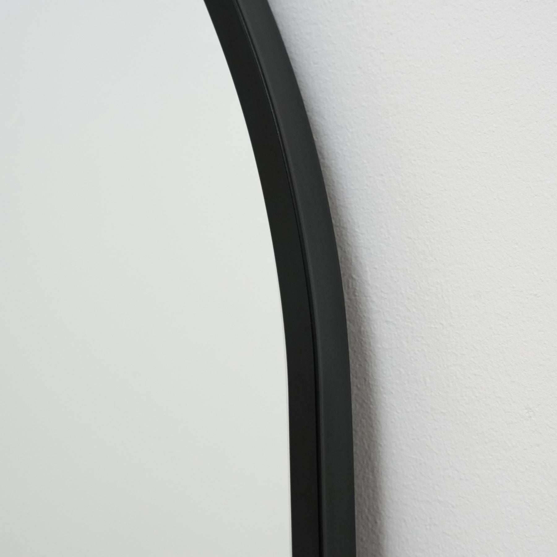 Black Full Length Arched Metal Mirror detail shot of arched frame