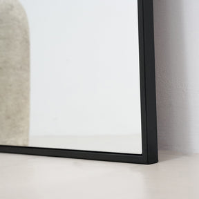 Black Full Length Arched Metal Mirror alternate detail shot of base corner