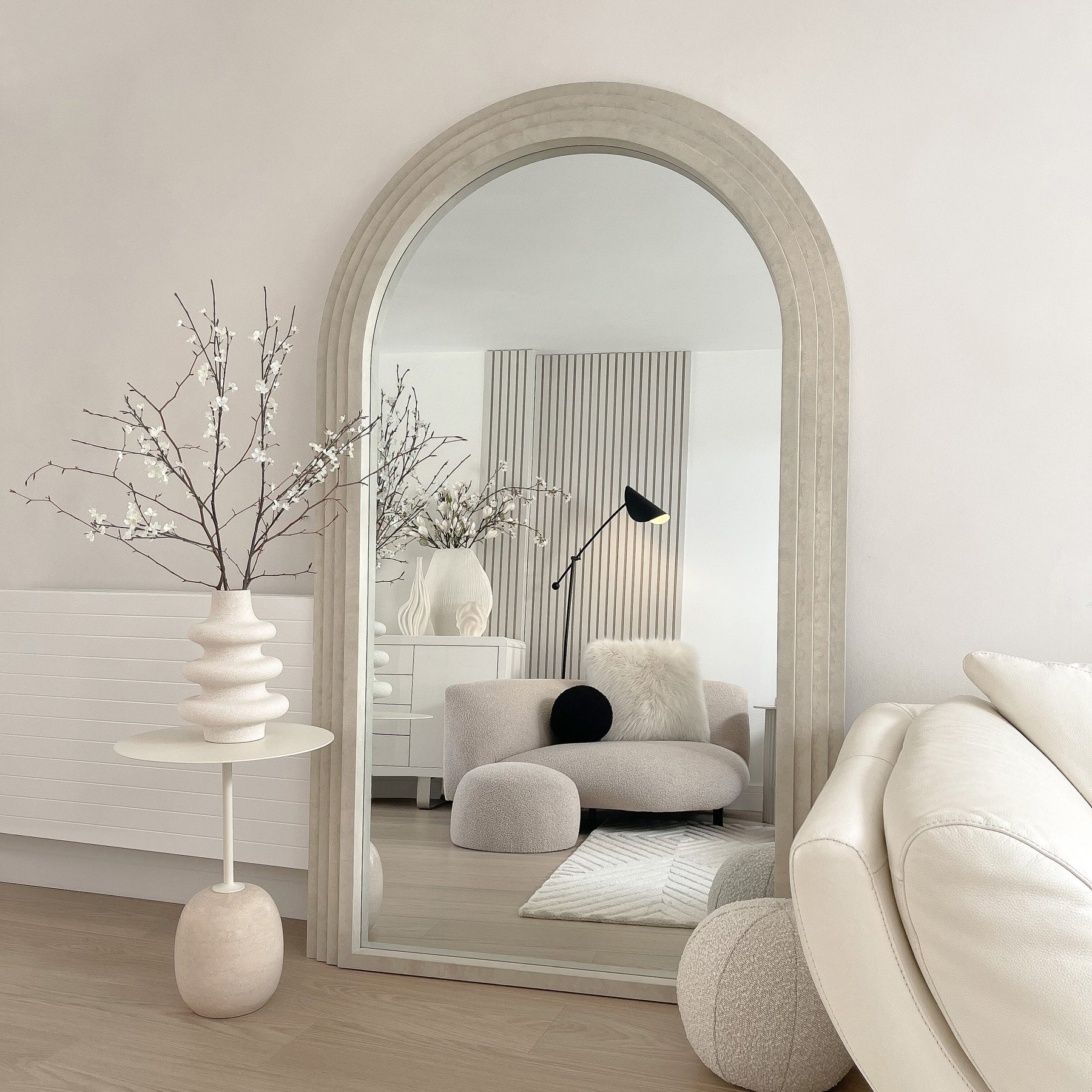 Full Length Arched Concrete Mirror in living room