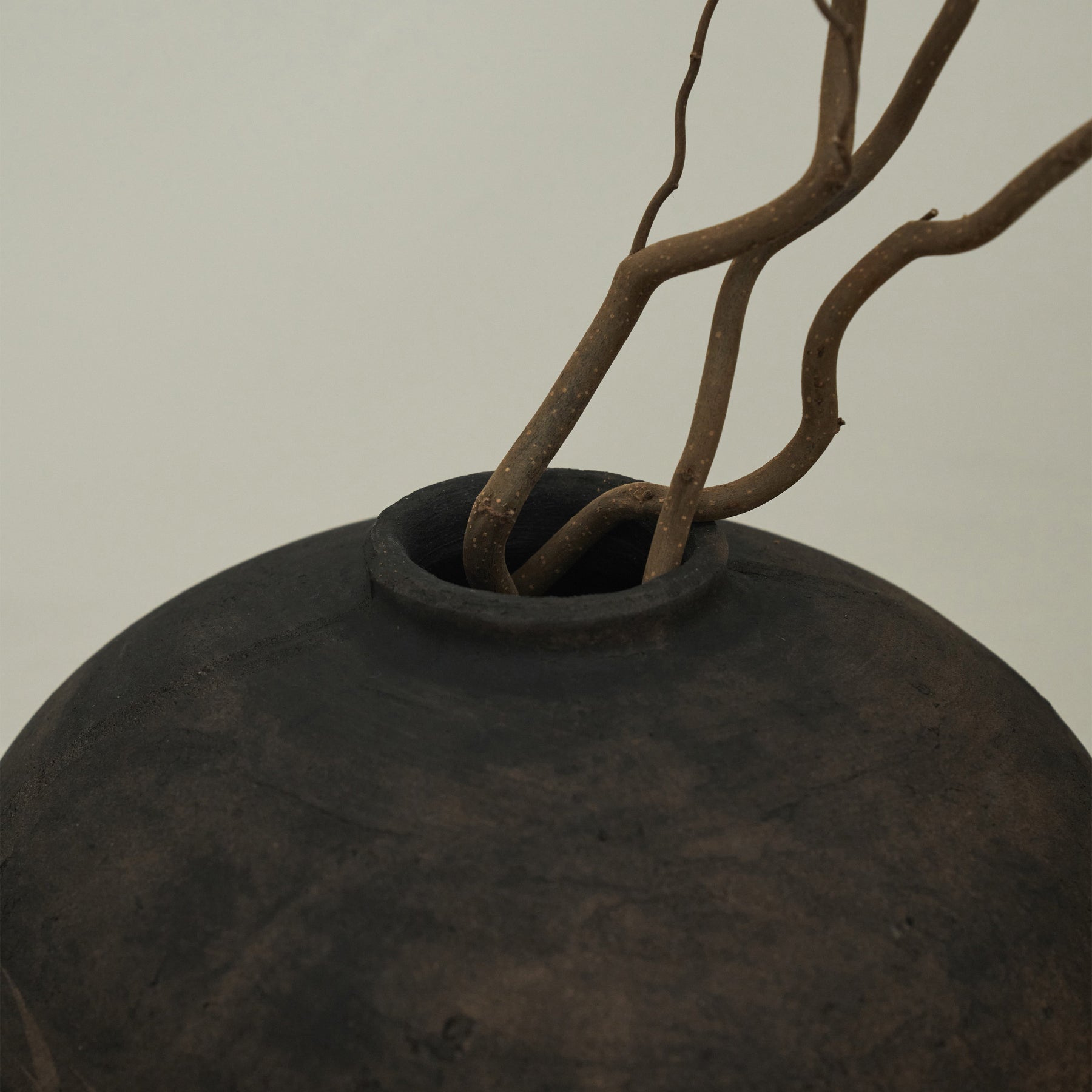 Detail shot of Black Textured Terracotta Vase rim