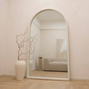 Full Length Extra Large Arched Concrete Mirror opposite sofa