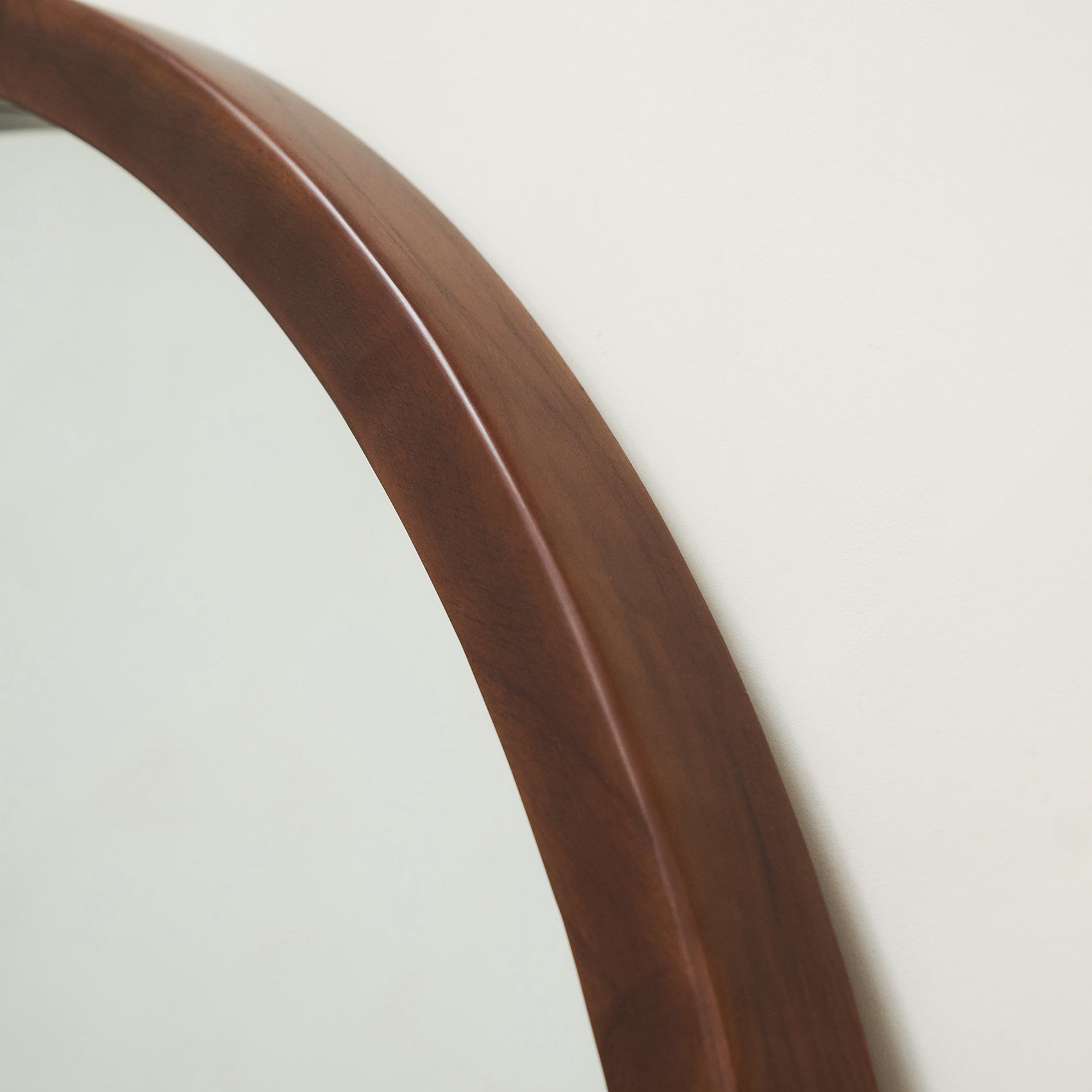 Detail shot of Extra Large Walnut Round Wall Mirror curve