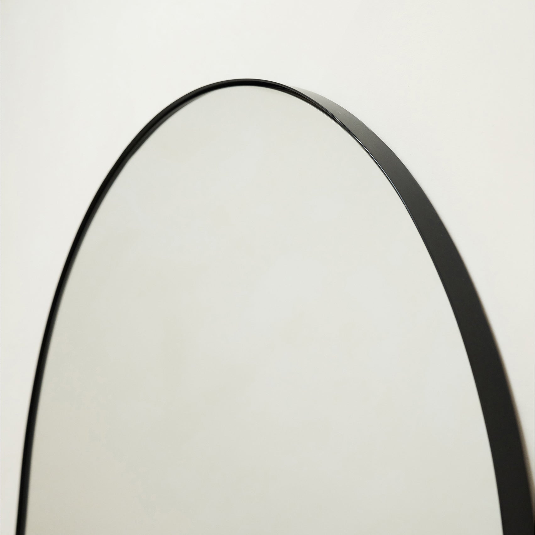 Detail shot of Full Length Extra Large Black Arched Metal Mirror arch