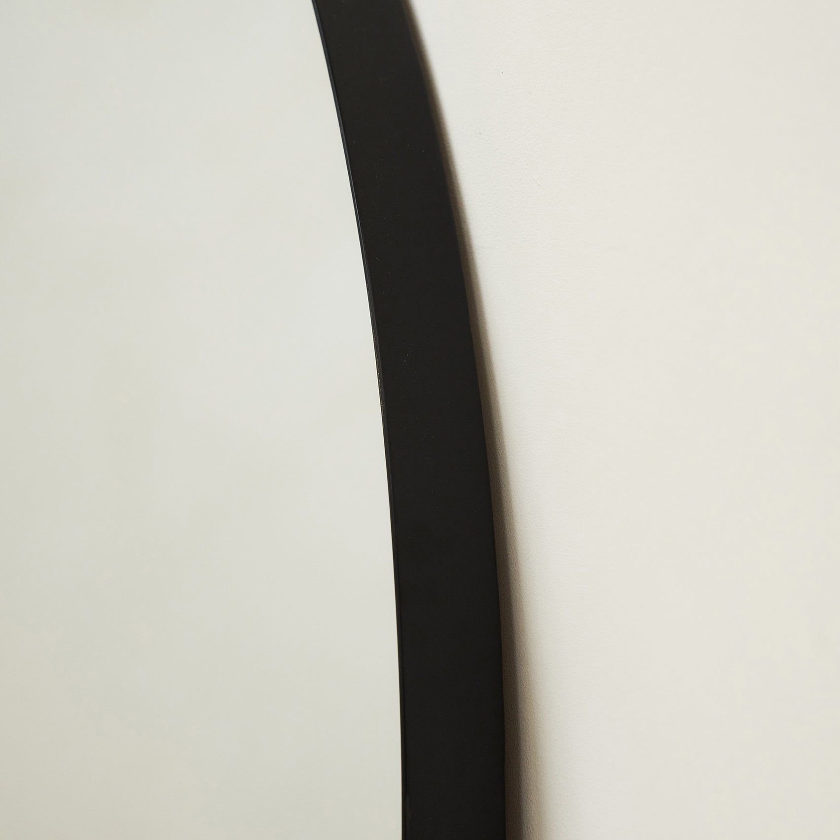 Closeup of Full Length Extra Large Black Arched Metal Mirror curved edge