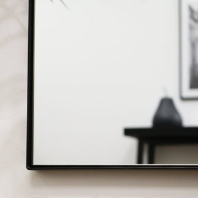 Detail shot of Black Rectangular Metal Wall Mirror corner