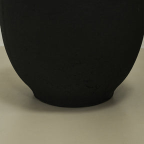 Detail shot of Black Textured Terracotta Vase base