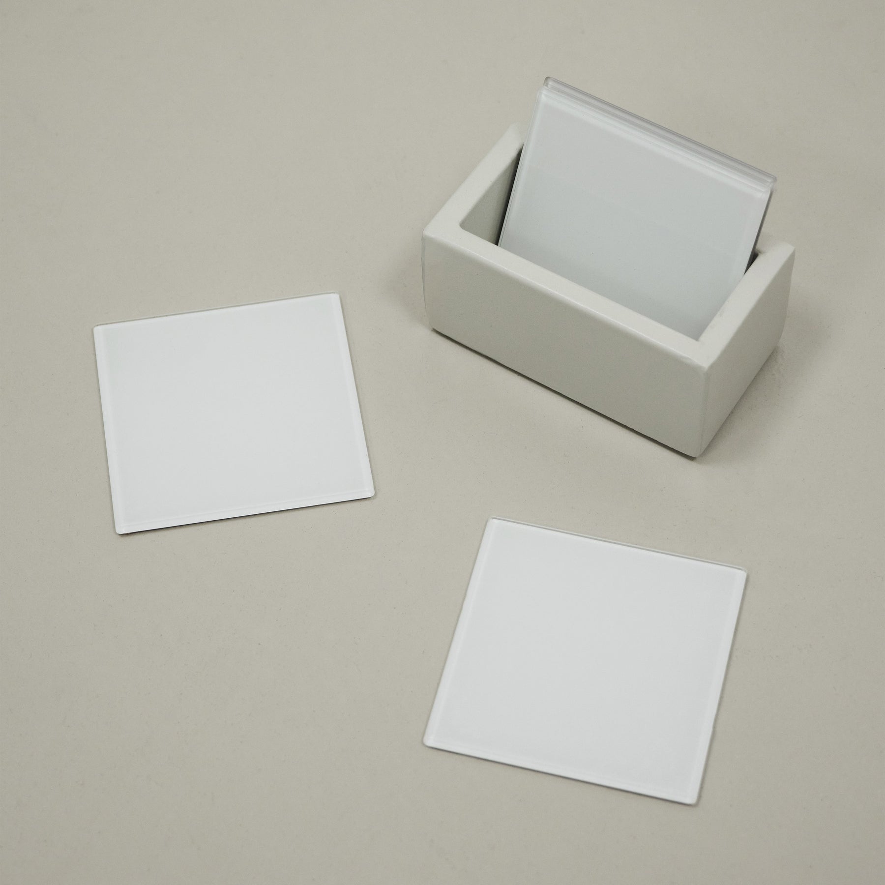 White coasters on table