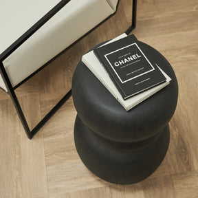 top-down view of Minimal Onyx Side Table beside chair