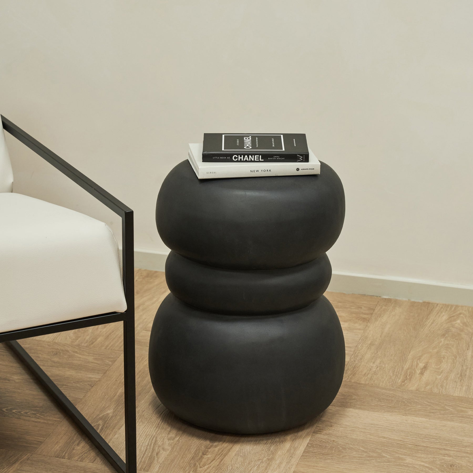 Minimal Onyx Side Table decorated with books