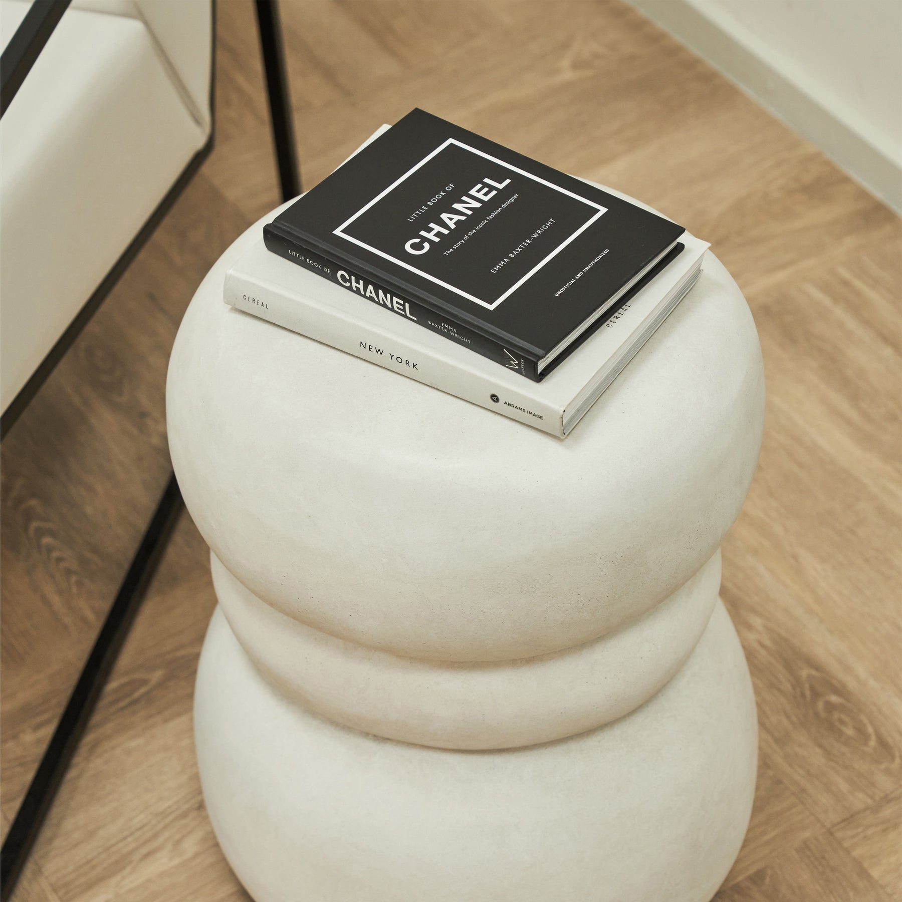 top-down view of Minimal Concrete Side Table decorated with books