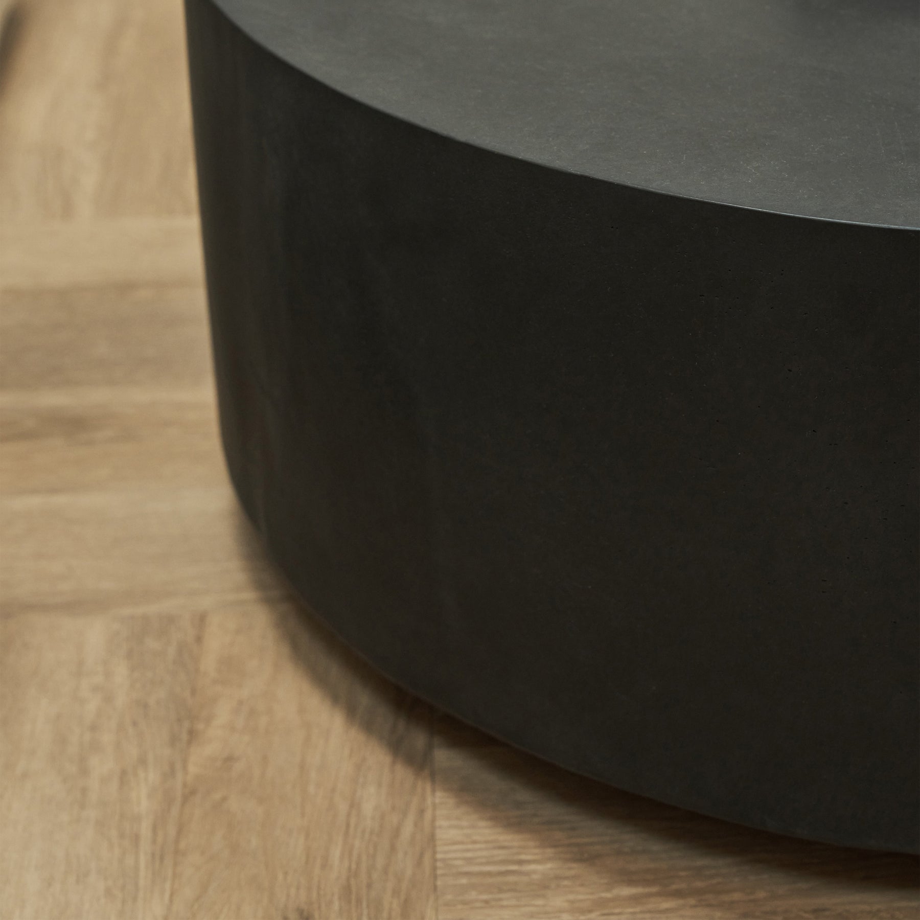 Closeup of Large minimal onyx round coffee table