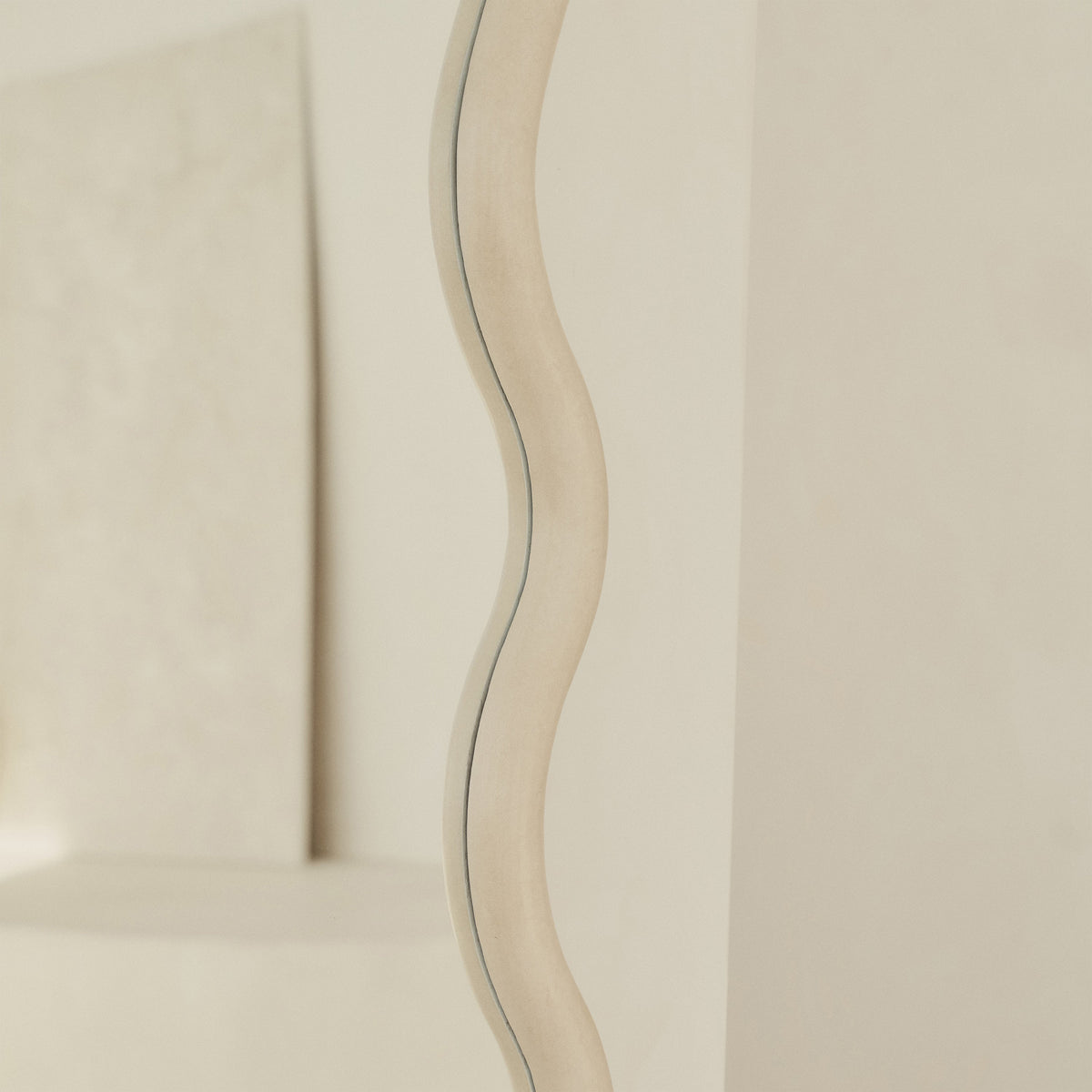 Detail shot of Large Full Length Concrete Wave Mirror rippled edge