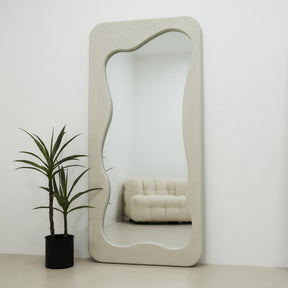 Full Length Irregular Concrete Mirror beside plant